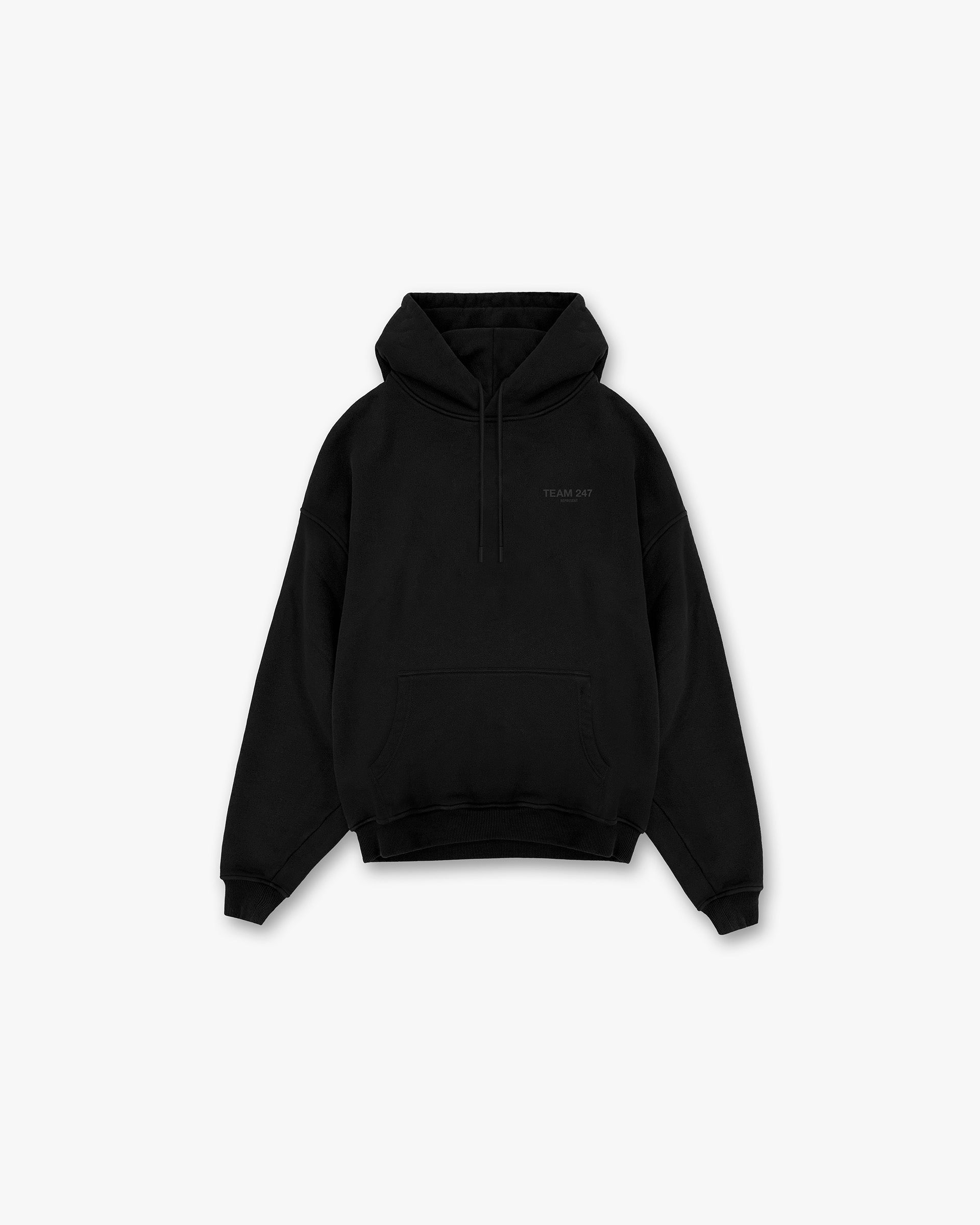 Front product image of a mens black oversized hoodie on a plain white background | Team 247 Oversized Hoodie in Matte Black | Very oversized hoodie | 247 Hoodies | Represent Clo
